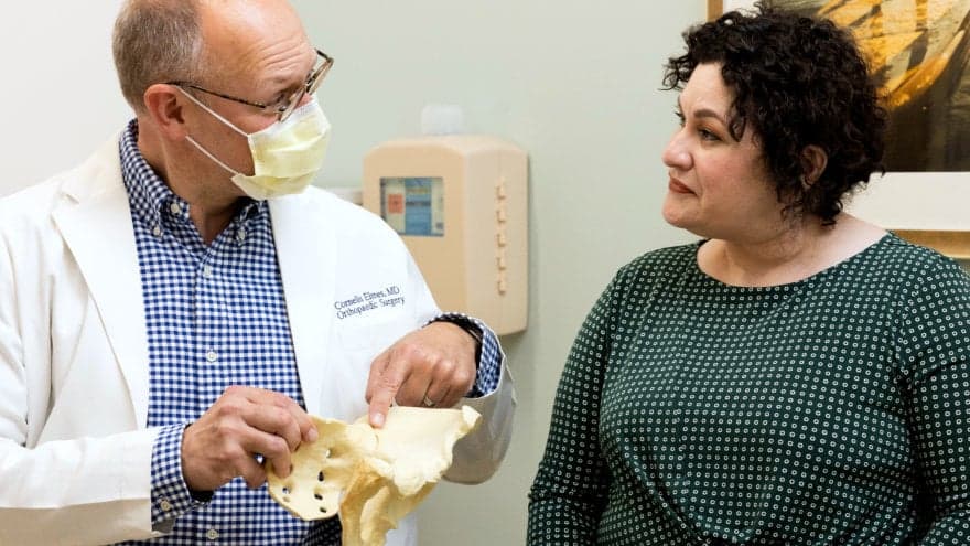 Northbay Orthopedic Specialist Dr. Cornelis Elmes, MD (left) and Maria Murillo (right) conversing together.